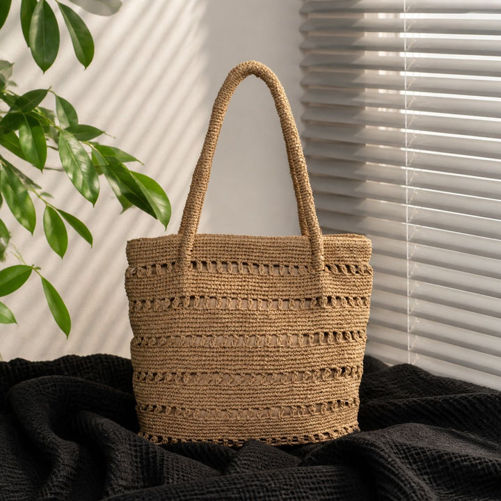 Handcrafted beach bag with open woven pattern Bowlift