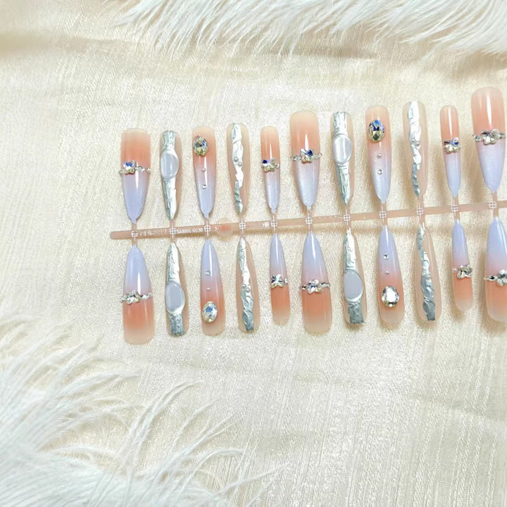 Artificial nails with elegant glitter design and fine 3D decorations Bowlift