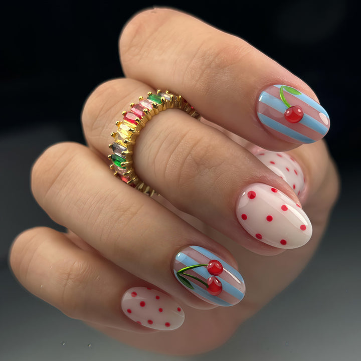 Artful Nail Art with Cherry Motifs Bowlift