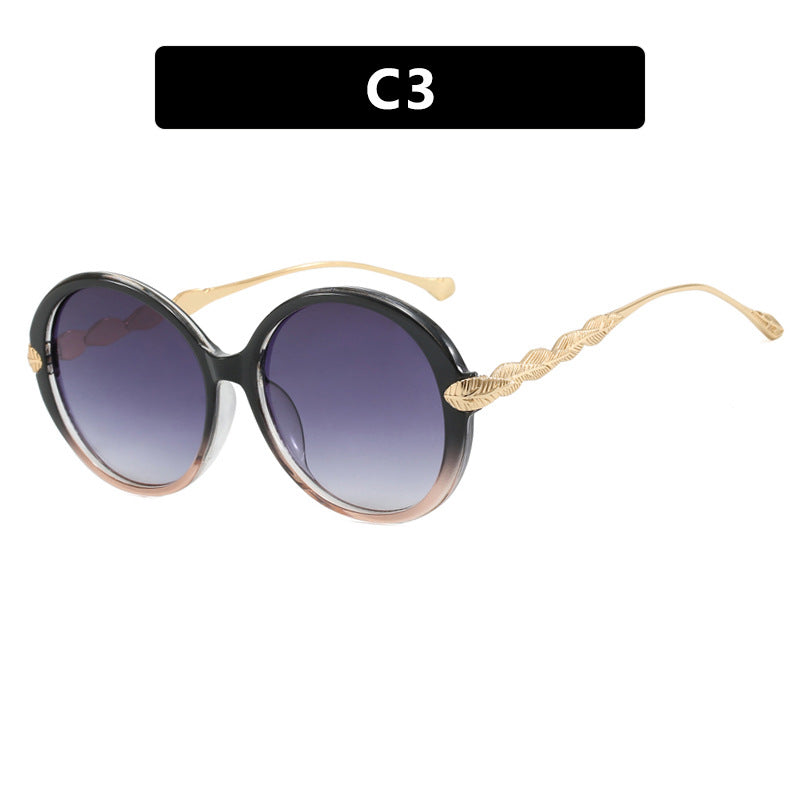 Ladies large round sunglasses with decorative metal accents Bowlift