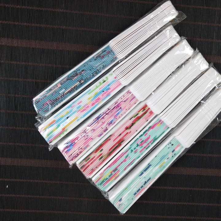 Ladies fan with shimmering scale patterns Bowlift