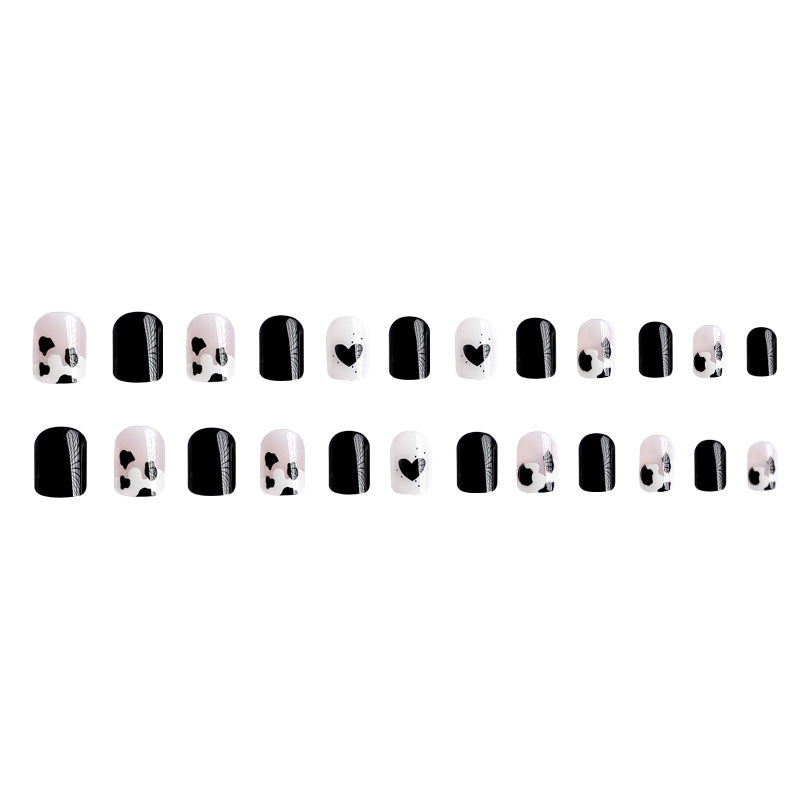 Creative nail art with heart and animal motifs Bowlift