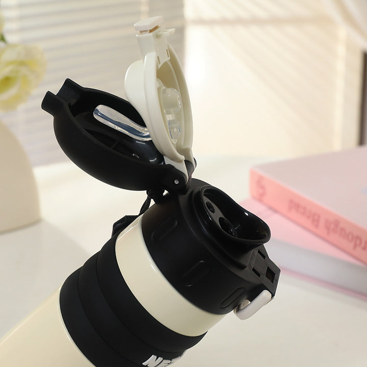 Women's Insulated Bottle with Playful Design and Practical Carry Handle Bowlift