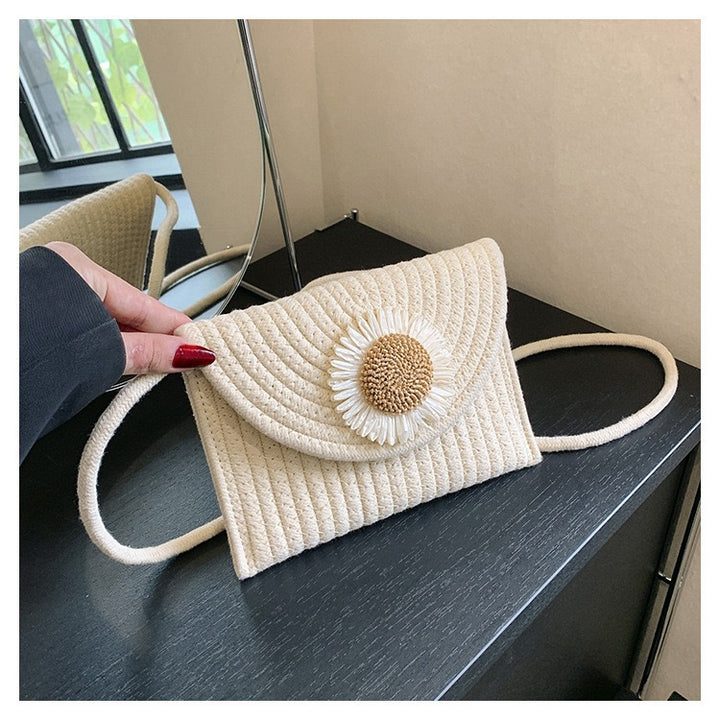 Fashionable shoulder bag with flower appliqué Bowlift