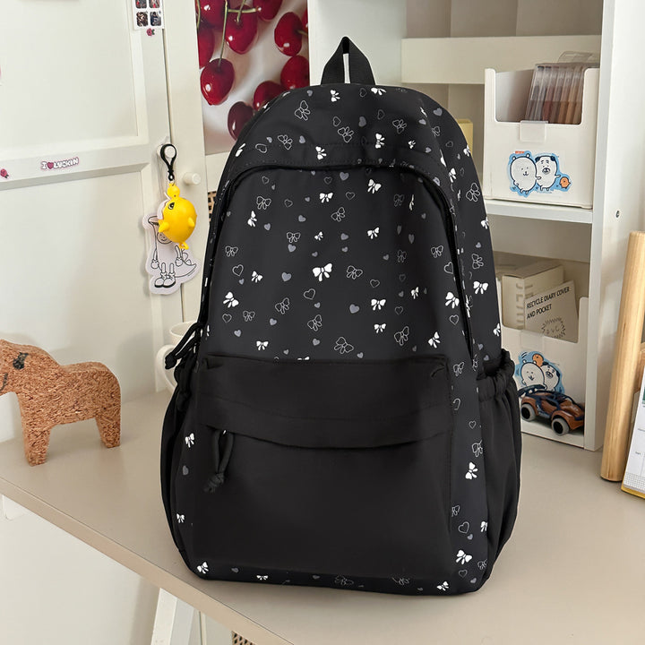 Playful Heart and Bow Patterned Backpack