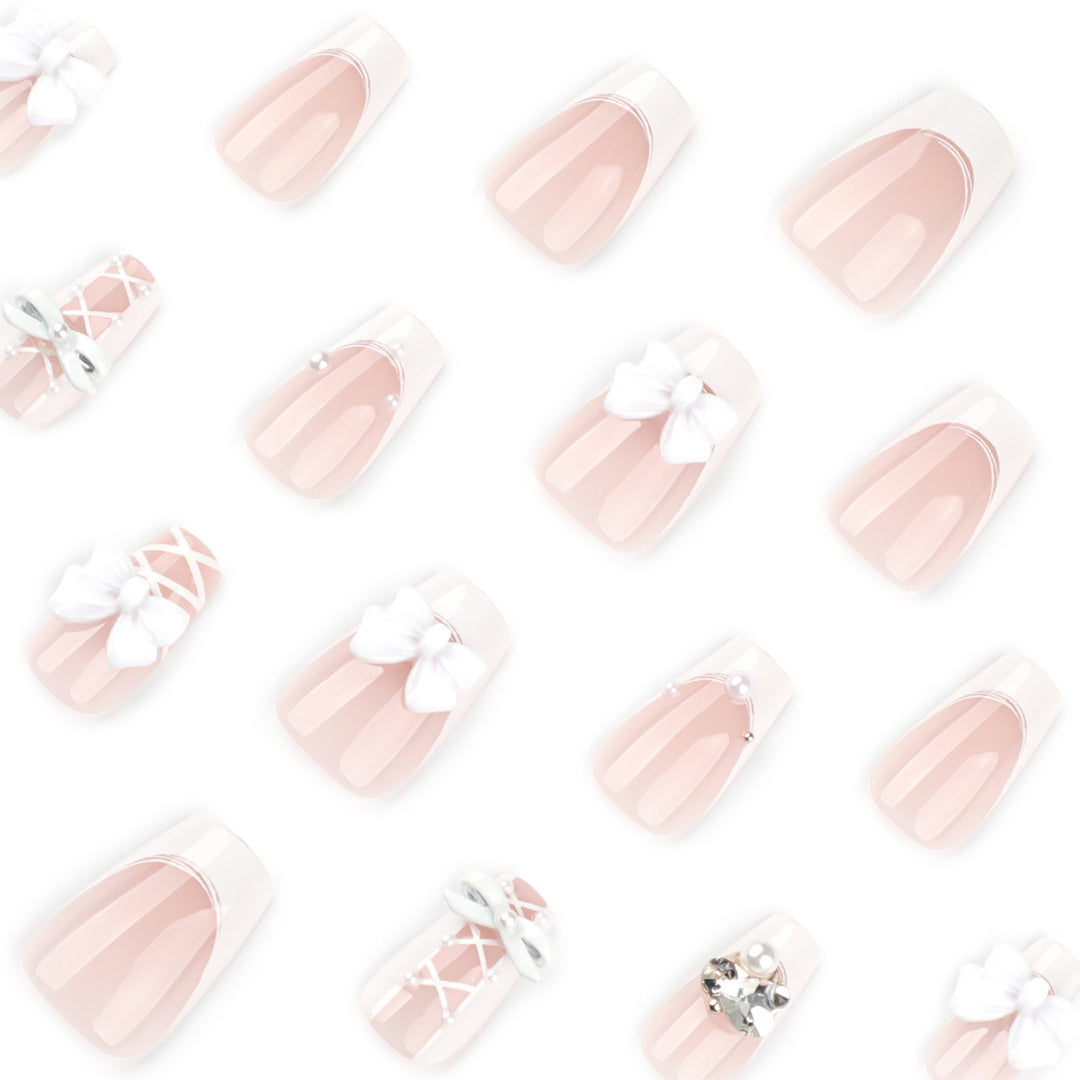 Artful Nail Art with Bows and Rhinestone Decorations Bowlift