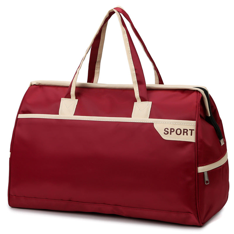 Sporty travel bag with reinforced handles and generous interior Bowlift