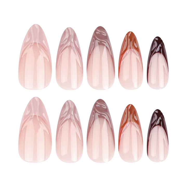 Artful stiletto nails with elegant gradient and glitter accents Bowlift