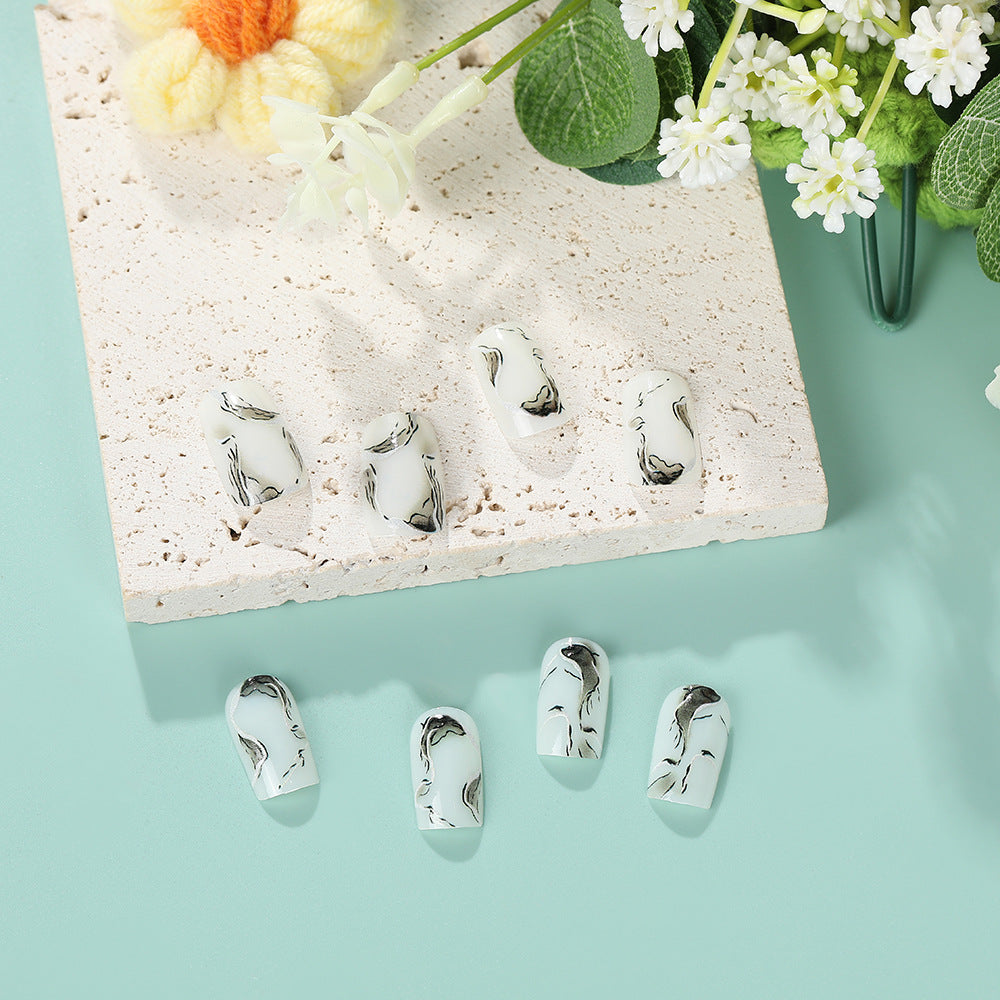 Artificial nails in an elegant minimalist style Bowlift