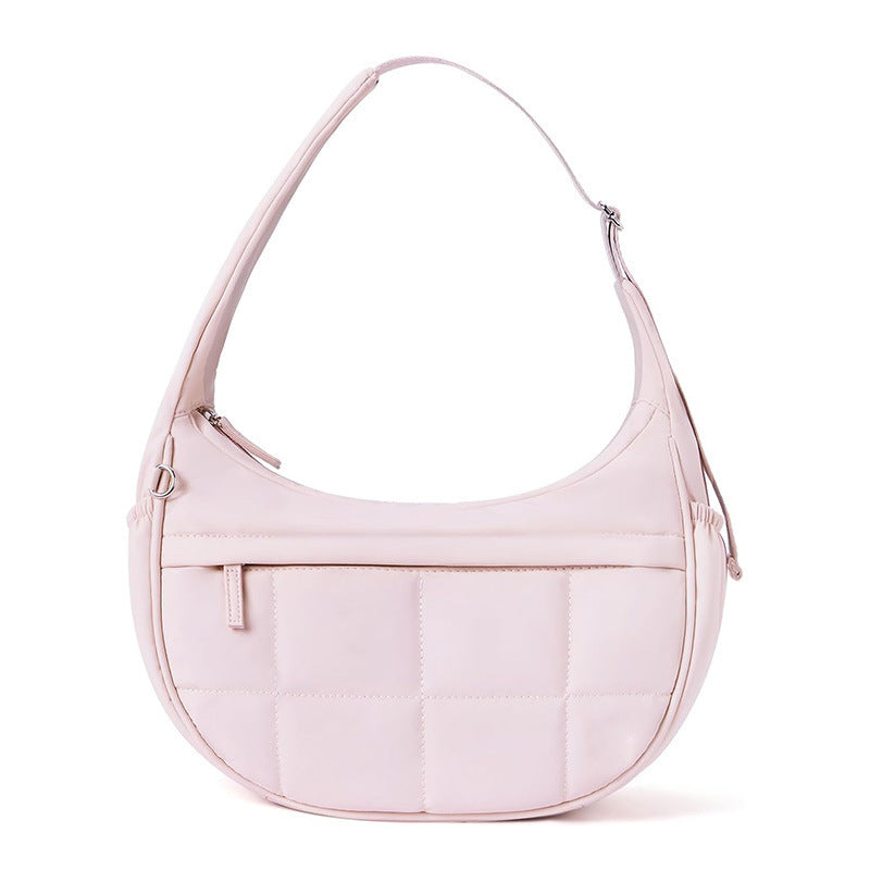 Fashionable shoulder bag with quilted surface Bowlift