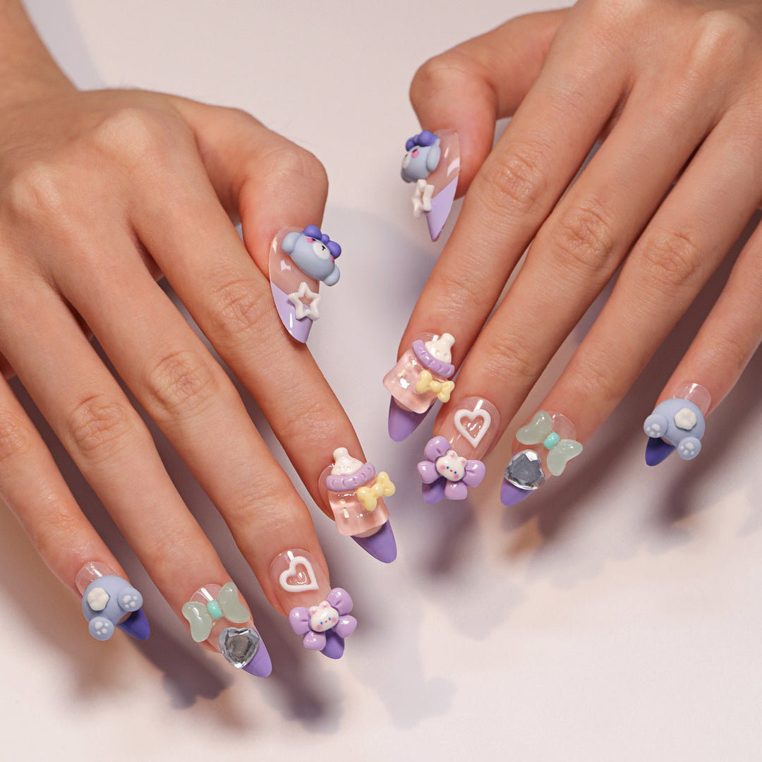 Artificial nail art with playful designs Bowlift