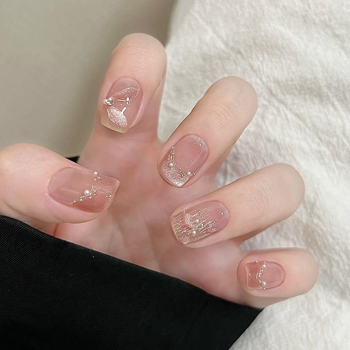 Handmade art nails with delicate embellishments Bowlift