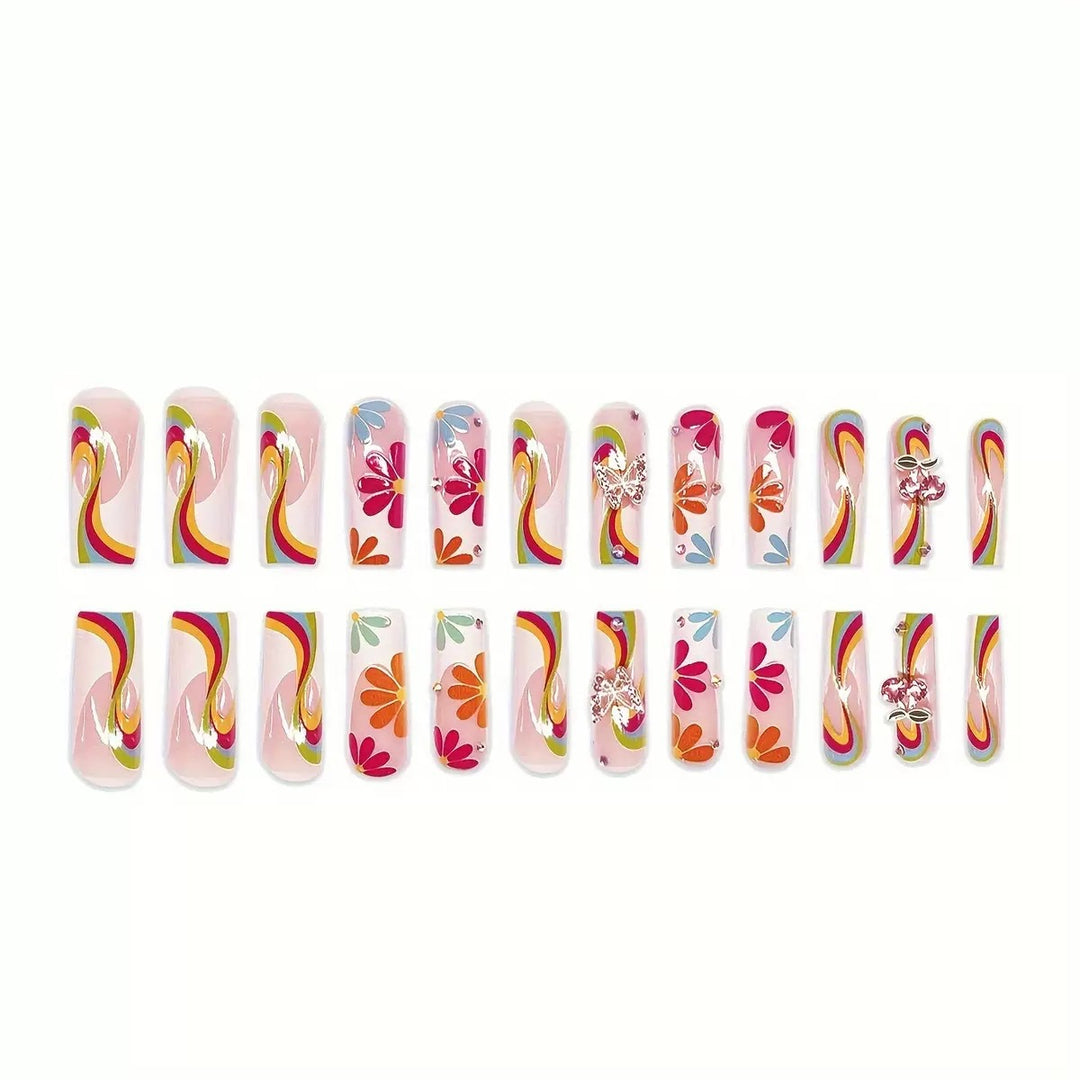 Nail art set with glowing flower motifs and glitter accents Bowlift