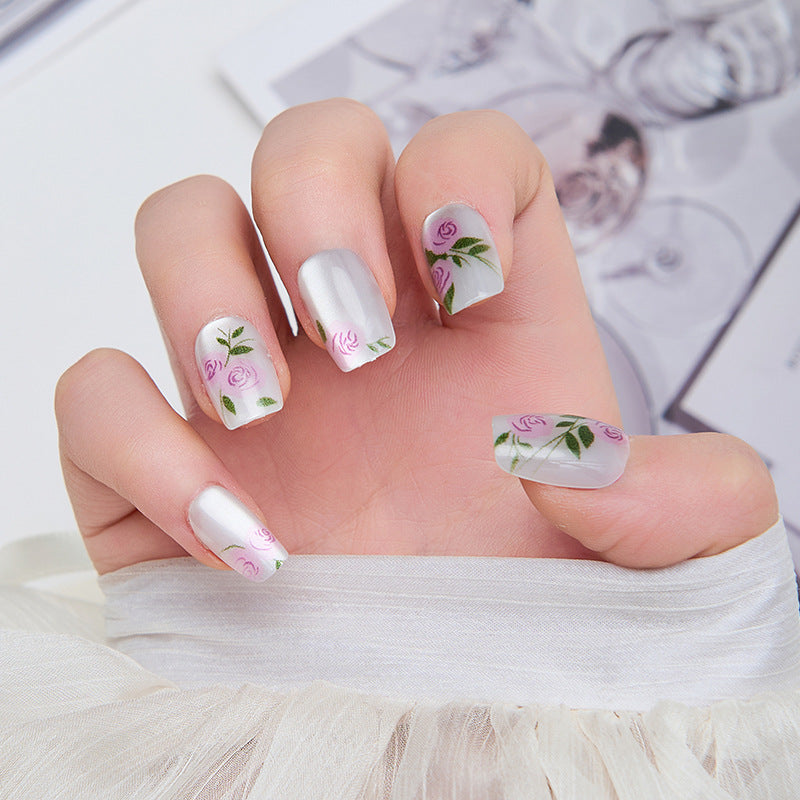 Artistic nail extensions with floral accents Bowlift