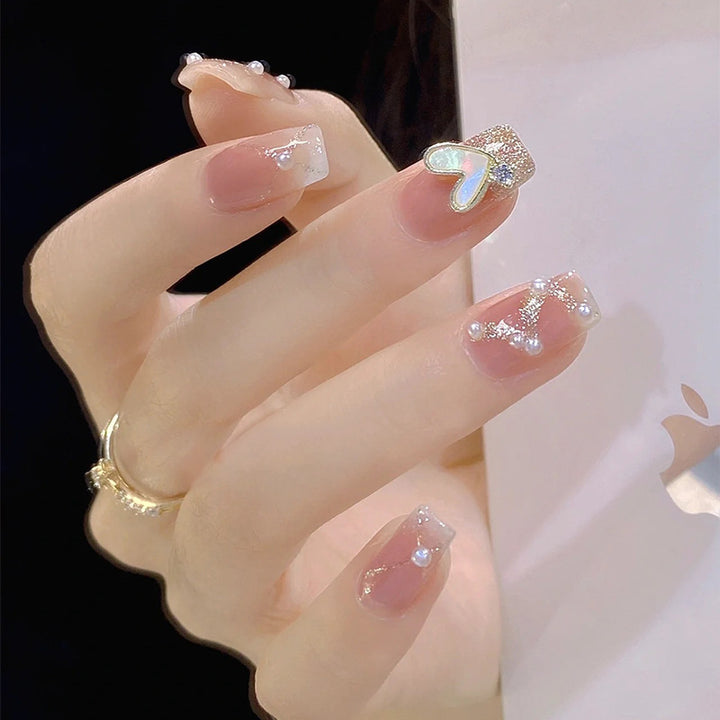 Artificial nail set with elegant pearl and glitter accents Bowlift