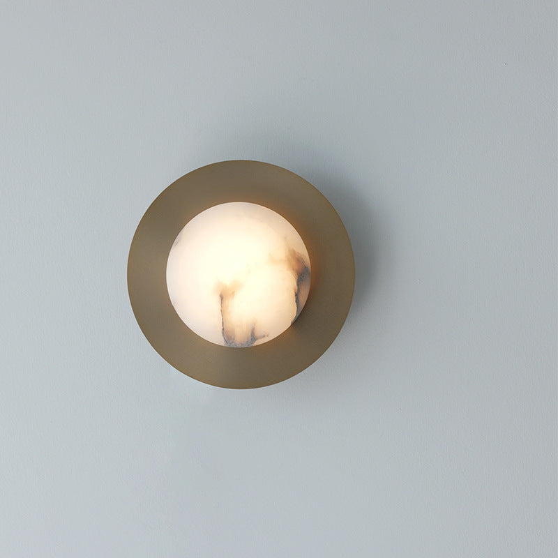 Contemporary alabaster globe wall sconce with round metal backplate Bowlift