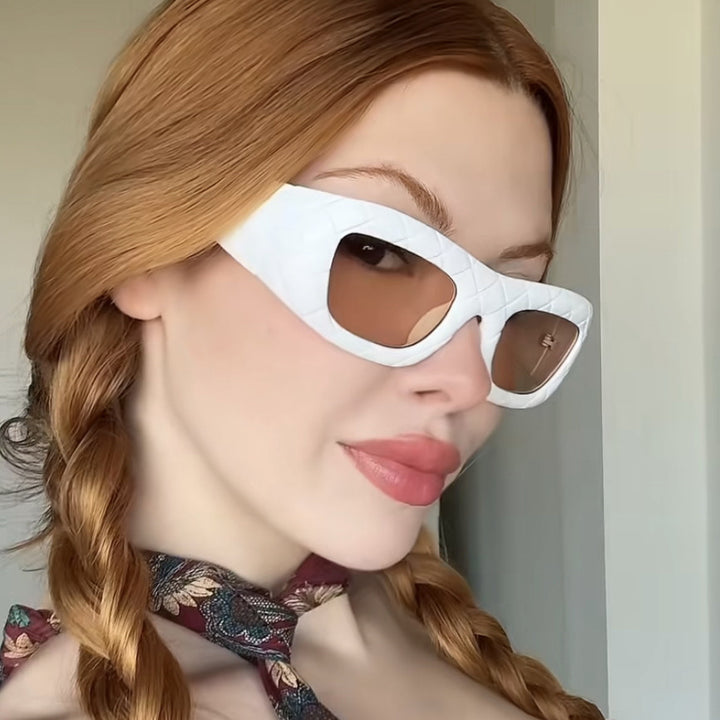 Ladies extravagant sunglasses with textured frame Bowlift