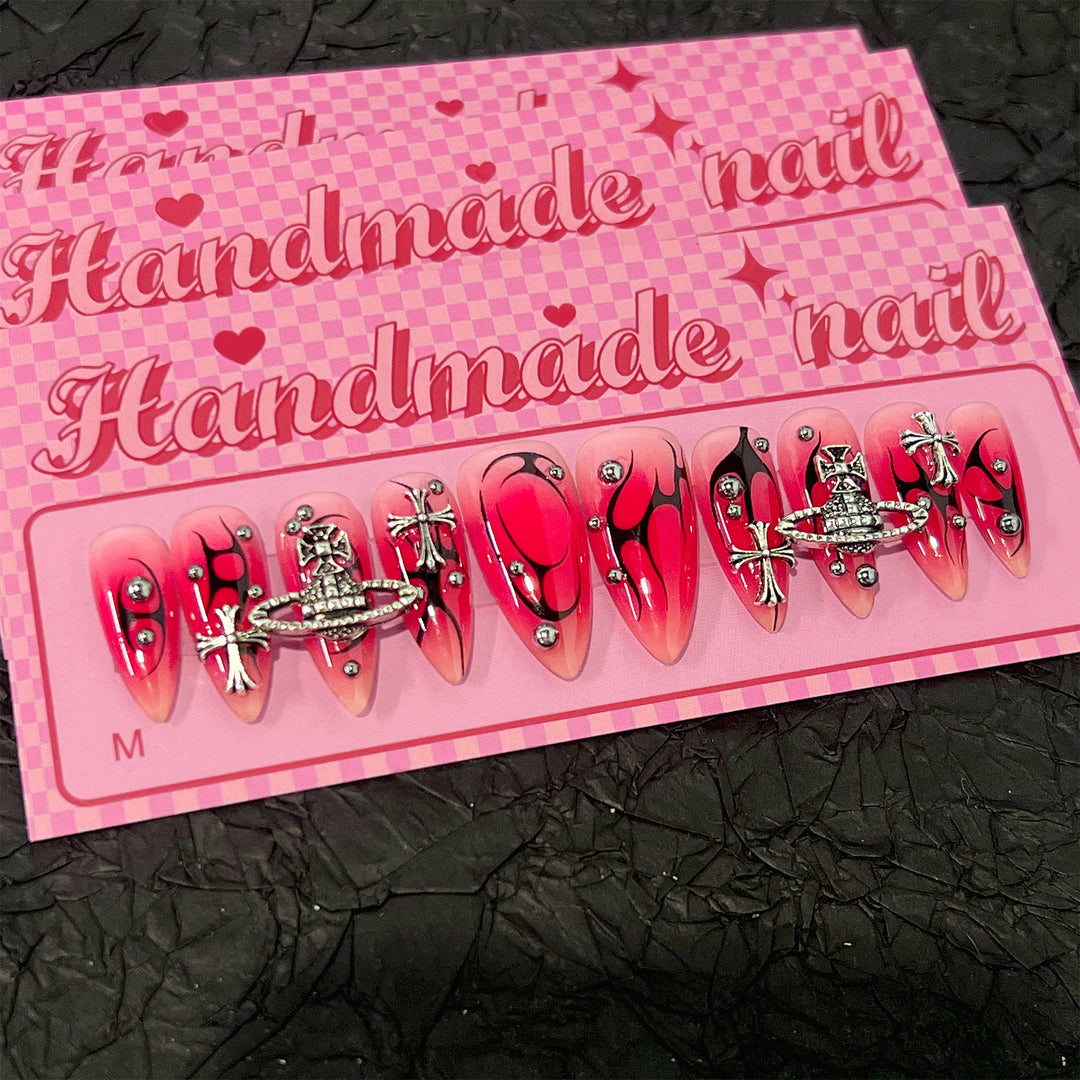Artistic artificial nails with unique designs and glitter accents Bowlift