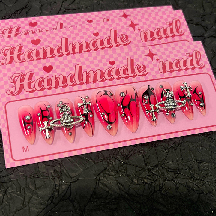 Artistic artificial nails with unique designs and glitter accents Bowlift