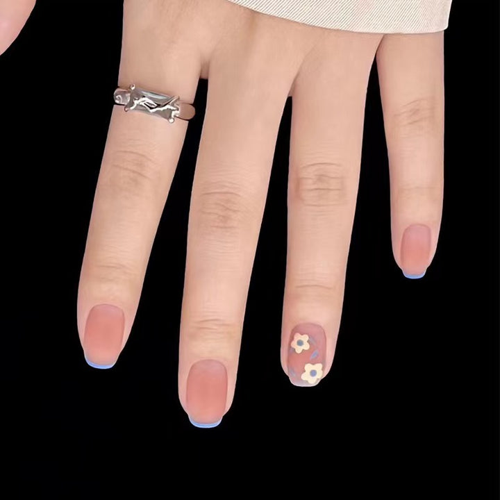 Creative nail design with floral accents Bowlift