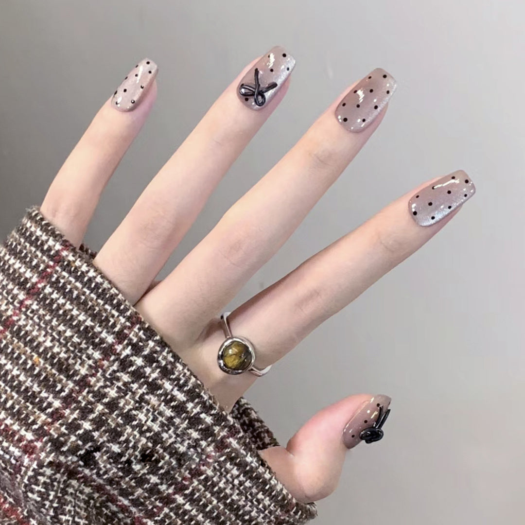 Artful Nail Extensions with Bow Pattern Bowlift