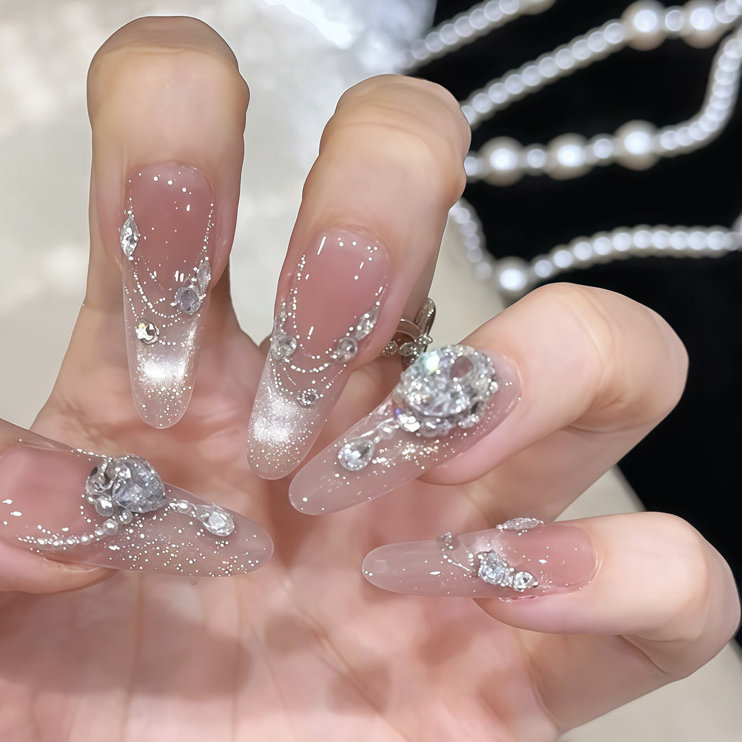 Glamorous artificial nail tips with rhinestone accents Bowlift