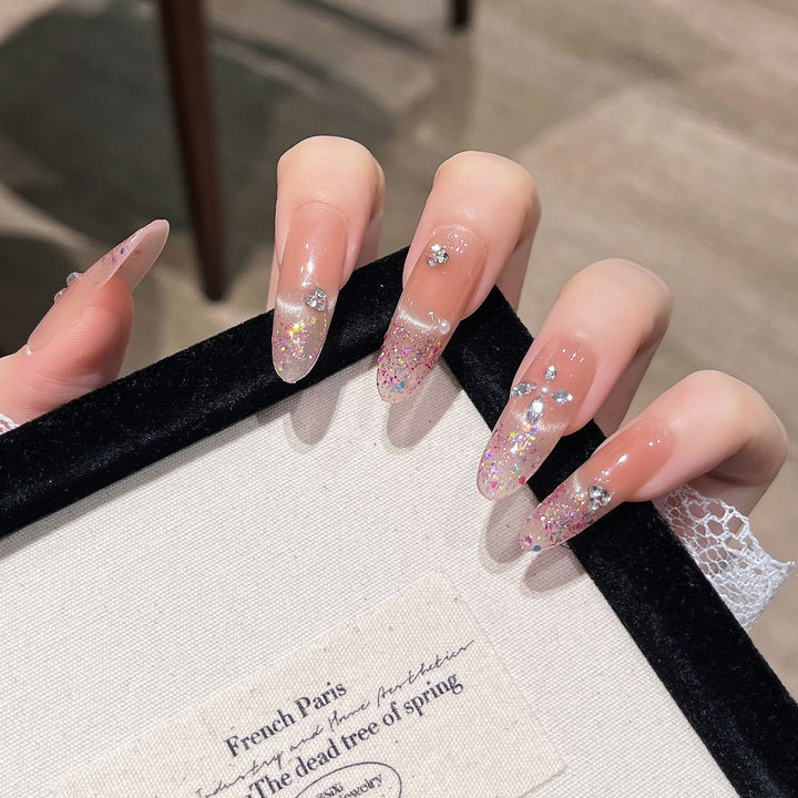 Elegant Glitter-Infused Press-On Nail Design Bowlift