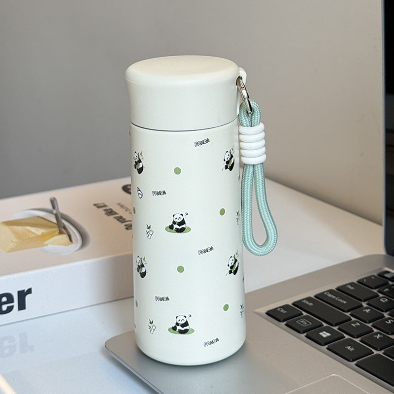 Women’s insulated drinking bottle with practical carrying strap and playful design Bowlift