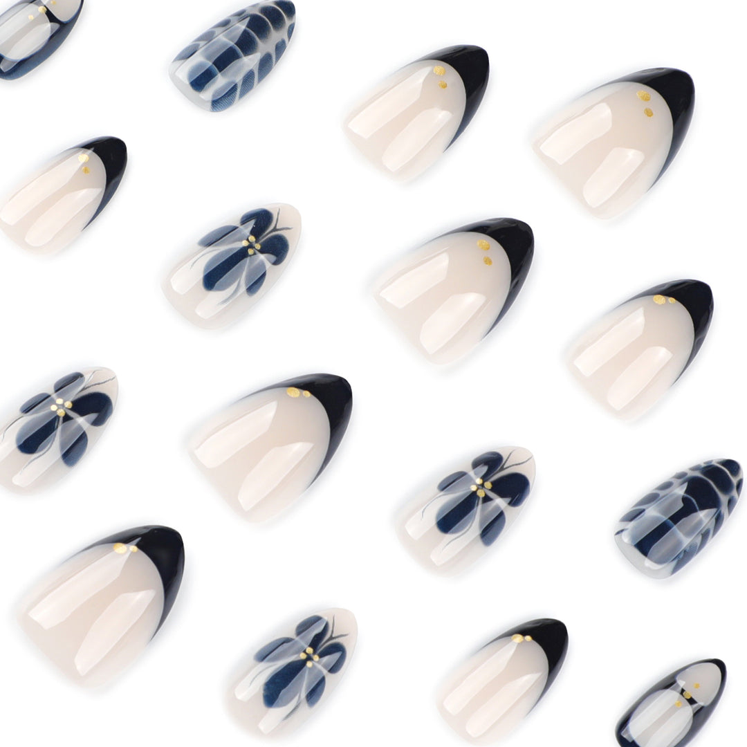 Artful nail art in elegant stiletto design with floral accents Bowlift