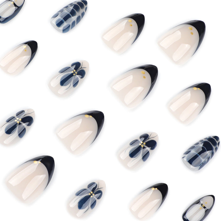 Artful nail art in elegant stiletto design with floral accents Bowlift