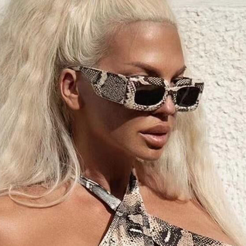 Women extravagant sunglasses with striking snake pattern Bowlift