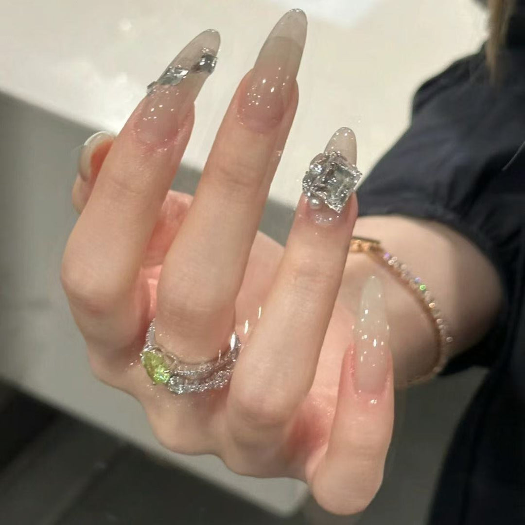 Elegant Stiletto Nail Extensions with Rhinestone Accents Bowlift