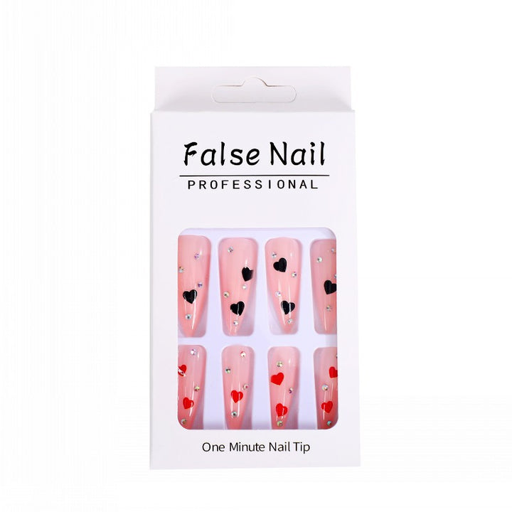 Glamorous artificial nails with heart accents Bowlift