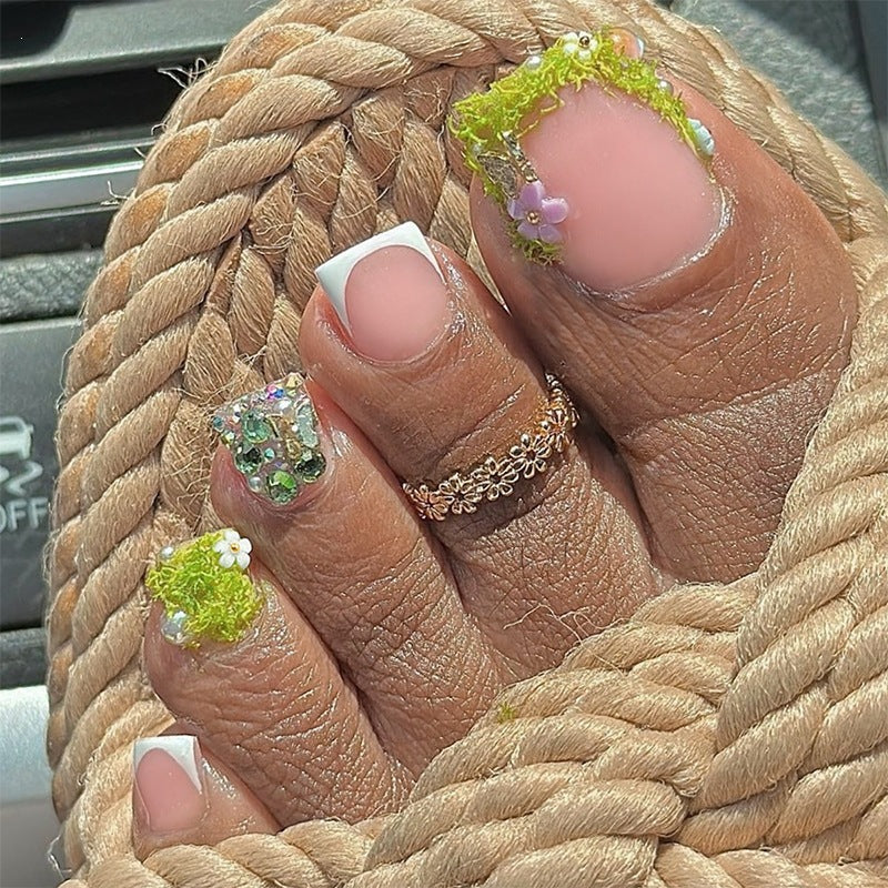 Creative nail set with glitter and flower designs Bowlift