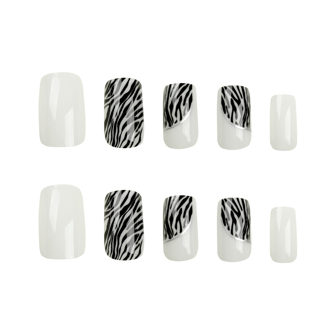 Artful nail extensions with stylish zebra pattern Bowlift