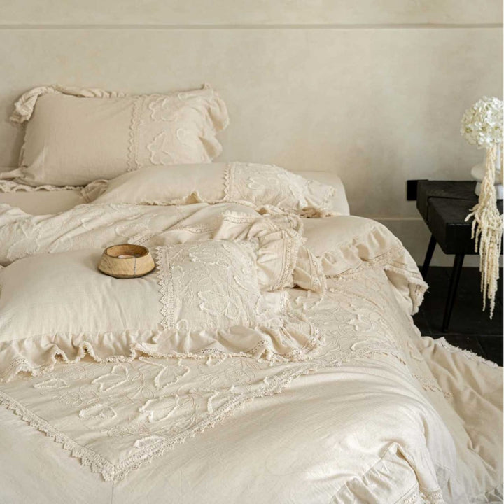 Linen bed linen set in Boho style with ruffles, relief embroidery and stonewashed finish