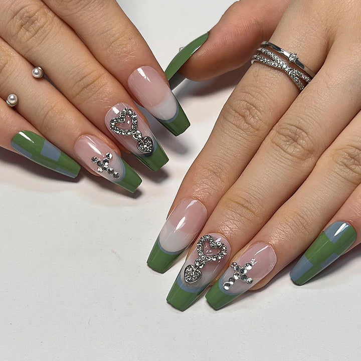 Artistic nail extensions with decorative jewelry effect Bowlift