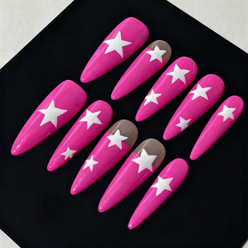 Artificial nails in elegant pointed design with star motifs Bowlift