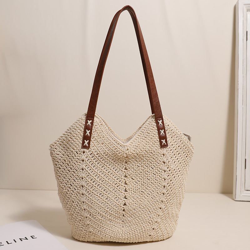 Handcrafted wicker bag with sturdy leather handles Bowlift
