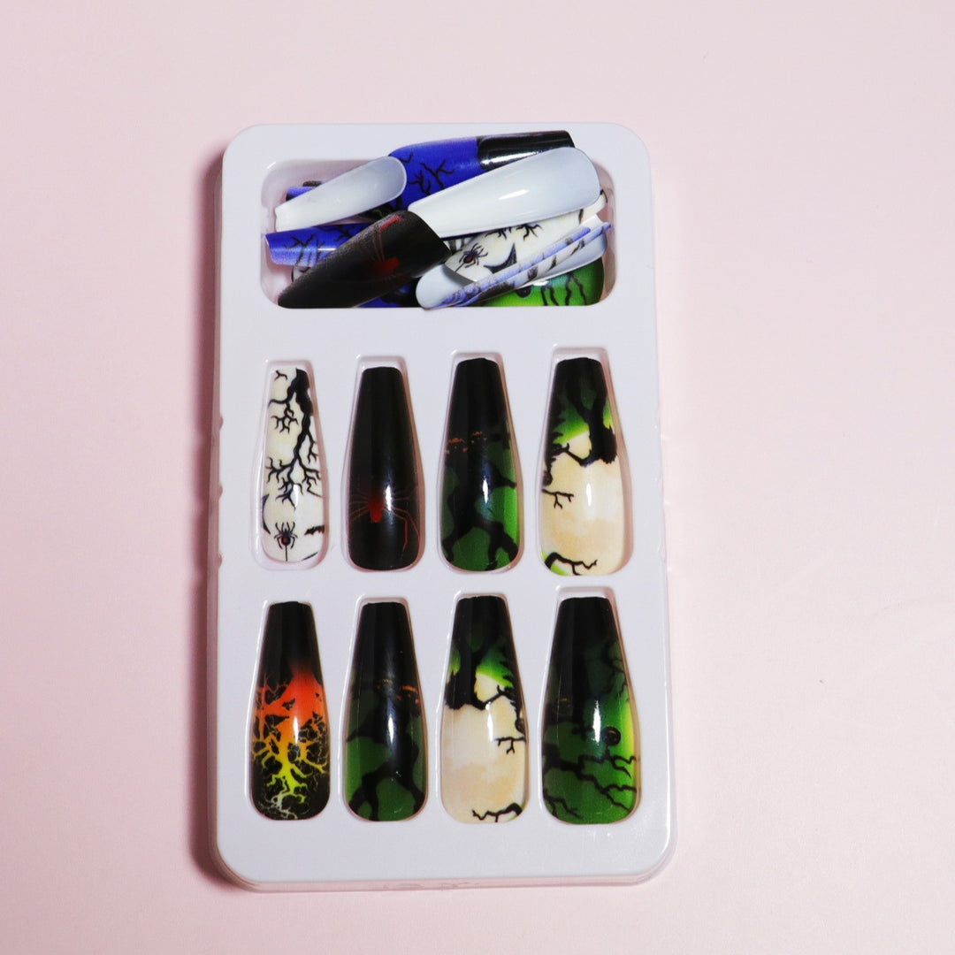Artistic Press-On Nail Design with Dripping Effect Bowlift