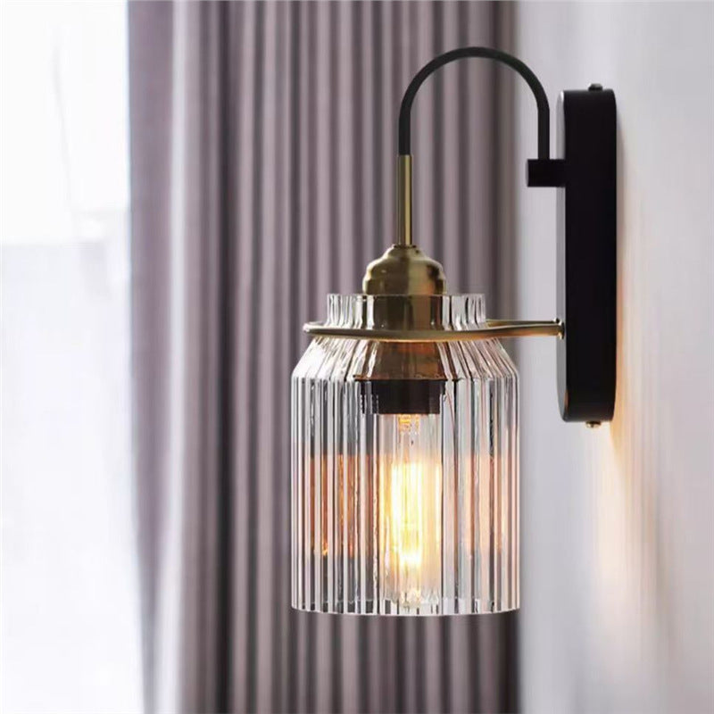 Ribbed Glass Wall Sconce with Curved Arm and Edison Bulb Compatibility Bowlift