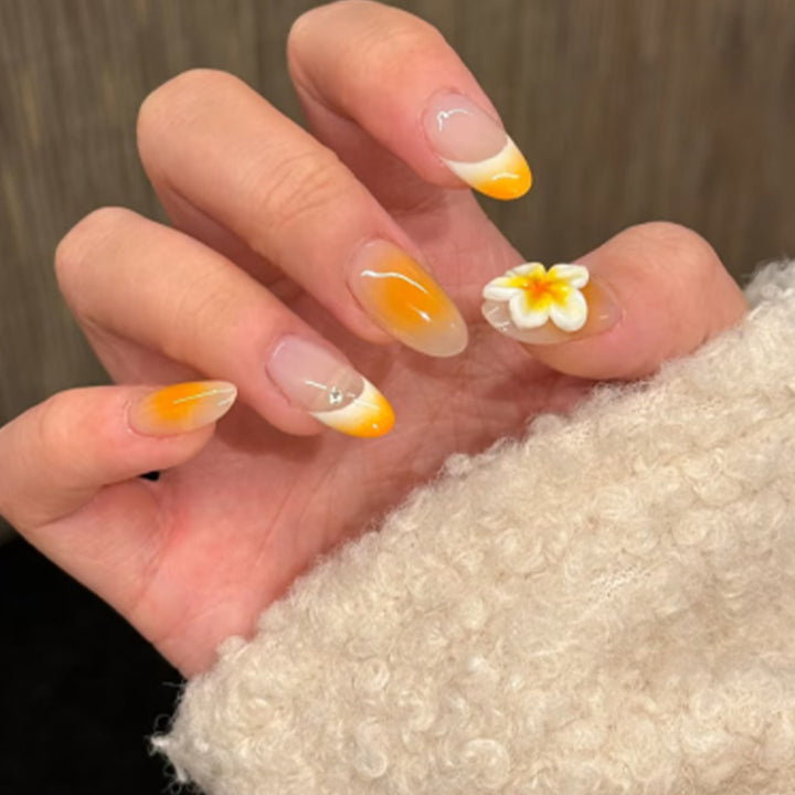Artful nail extensions with delicate ombre effect and floral accents Bowlift