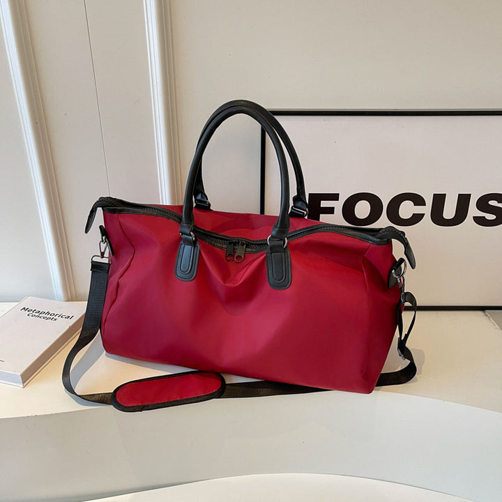 Elegantly Designed Travel Bag with Multifunctional Interior Compartments Bowlift