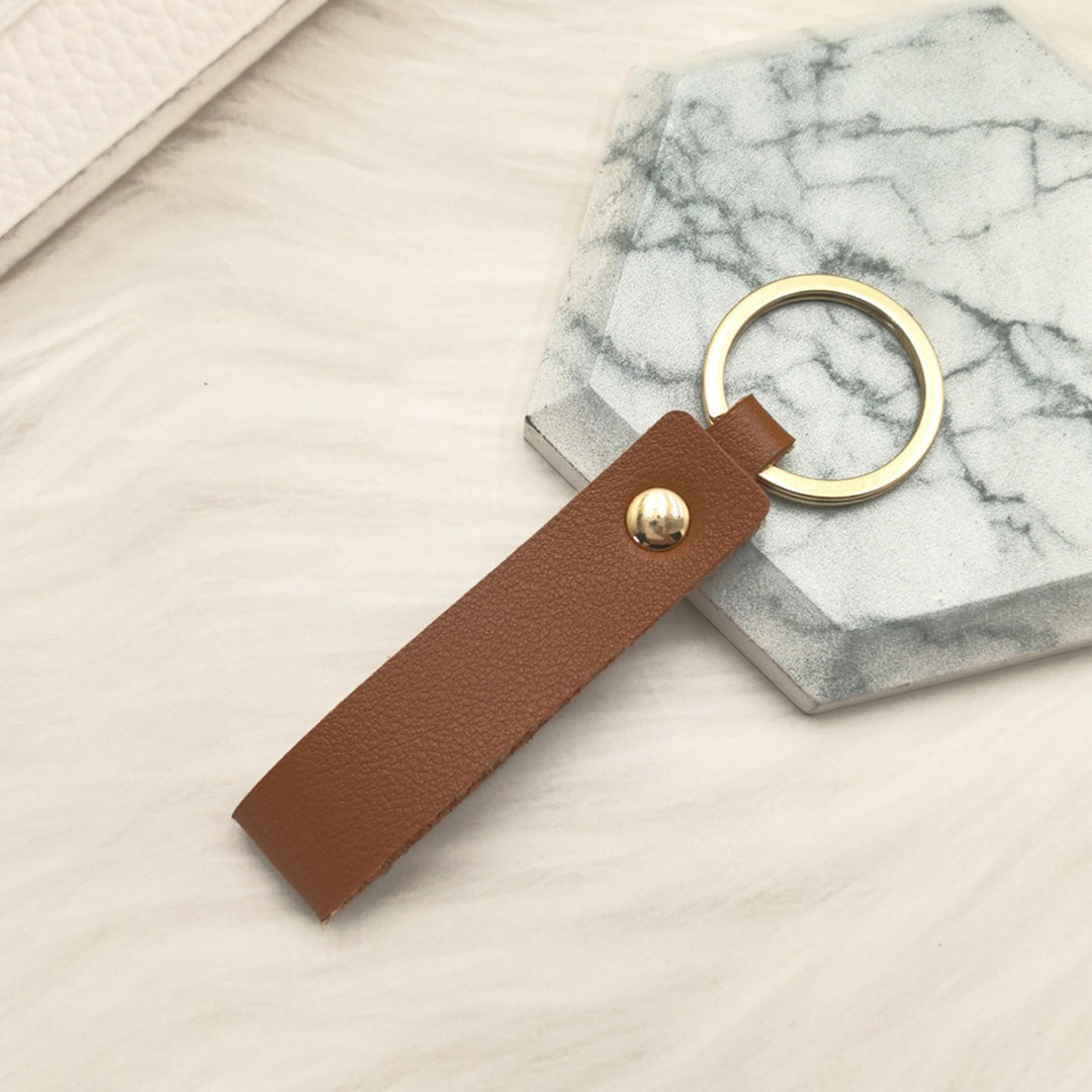 Unisex keychain with elegant artificial leather design Bowlift