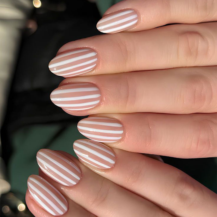 Stylish nail art with elegant stripe patterns Bowlift