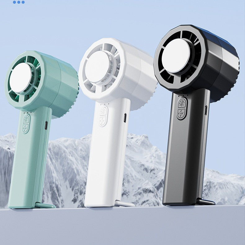 Unisex portable mini hand fan with USB-C charging port and integrated mist spray function Bowlift