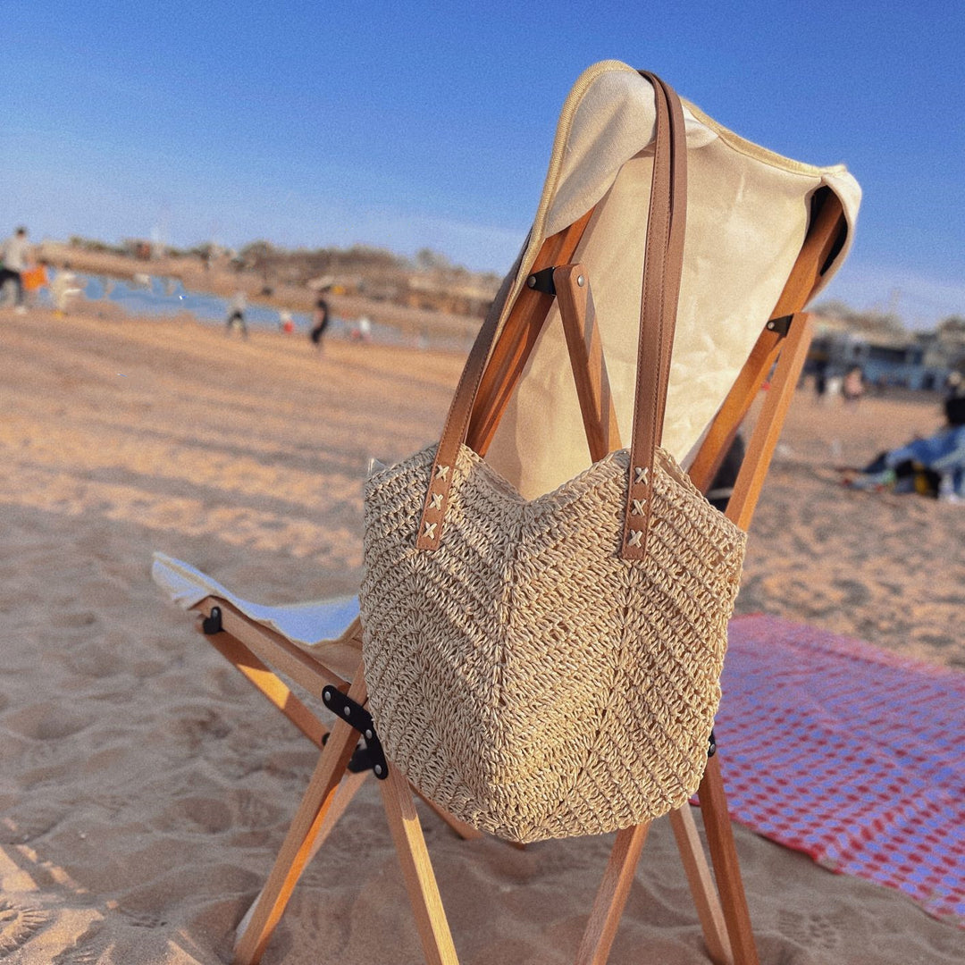 Casual bag made of handwoven straw with wide leather handles Bowlift