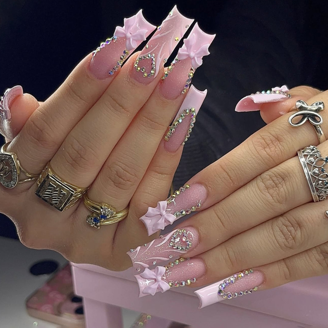 Artful stiletto nails with glitter accents Bowlift