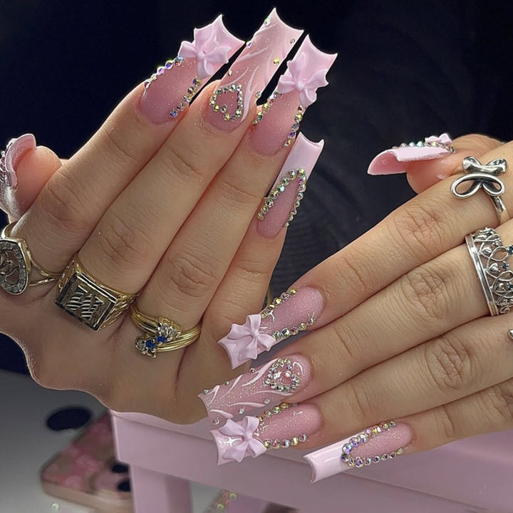Artful stiletto nails with glitter accents Bowlift