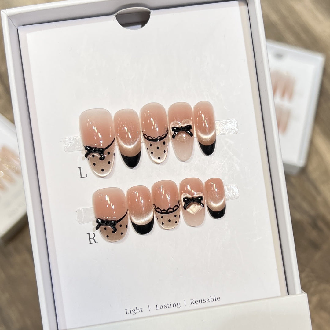 Elegant Reusable Press-On Nail Art Set with Charming Bow Accents Bowlift